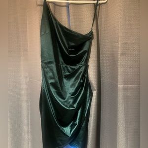 one shoulder green mini dress perfect for a homecoming dance or any occasion